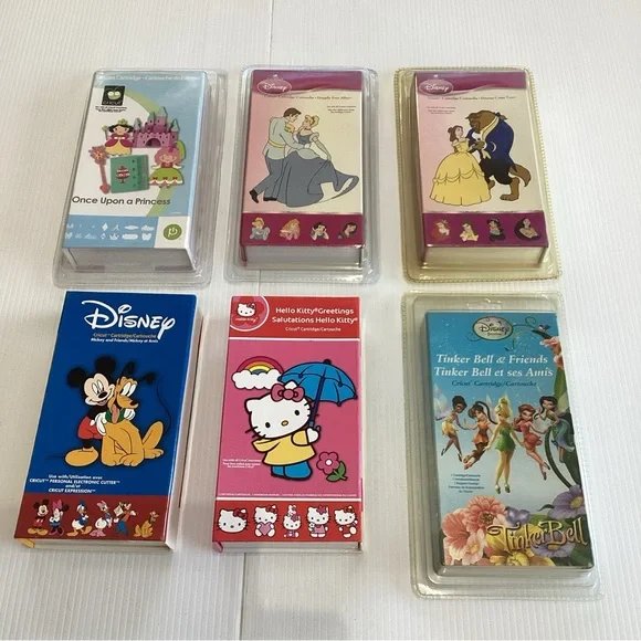 Cricut Disney Cartridge Bundle Lot of 6 Mickey Hello Kitty Tinker bell Belle - Picture 1 of 10